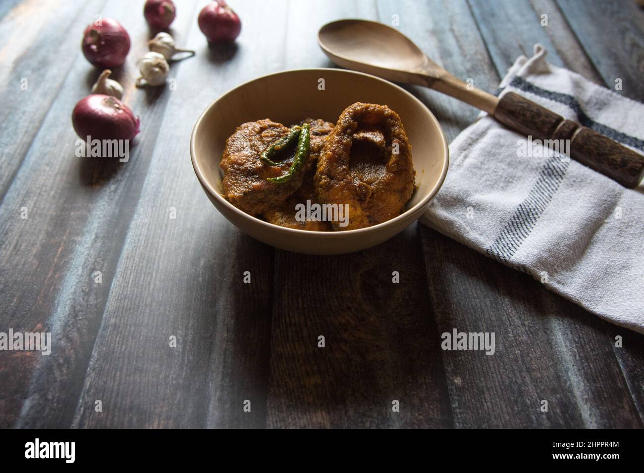 Popular Bengali non vegetarian dish fish kalia or masala served in a