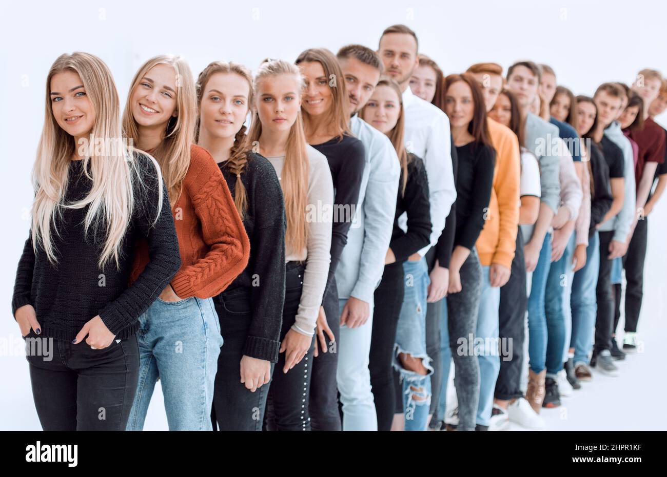 group of diverse young people standing in line Stock Photo - Alamy