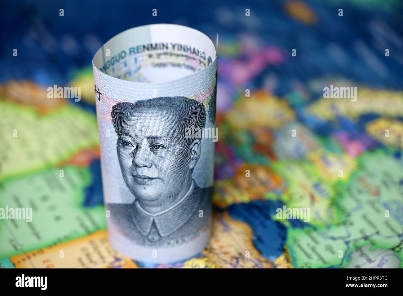 Yuan on map of Europe and North Africa, concept of trade between the China and european countries. Chinese investment in EU, tourism, exchange rate Stock Photo