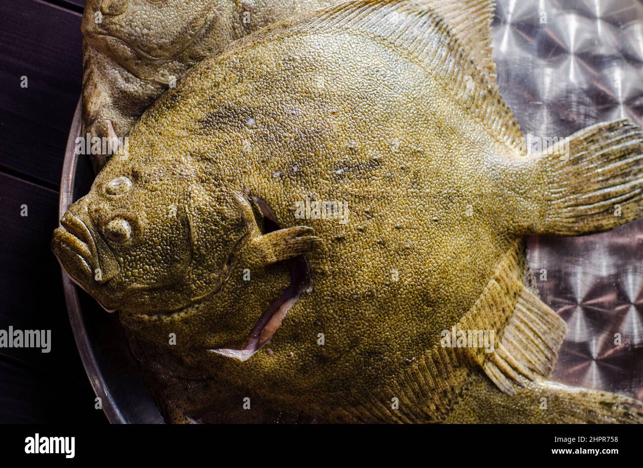 raw cleaned whole flounder fish ready for cooking Stock Photo Alamy