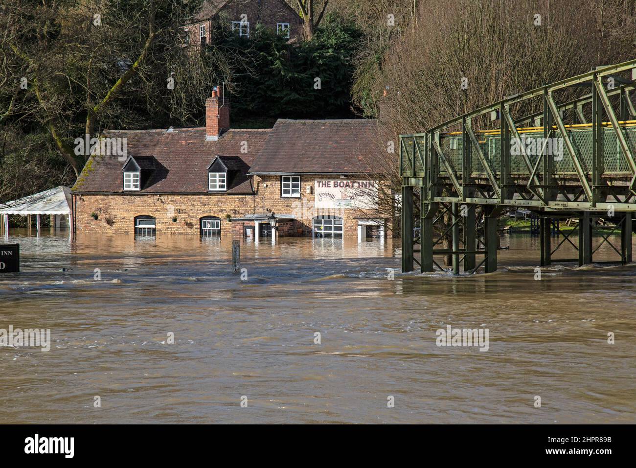 Shropshire, England. 23/02/2022, The Boat Inn, in the village of Jackfield in the Ironbridge Gorge in Shropshire, flooded, after the River Severn burst its banks after a week of storms and heavy rain. Stock Photo