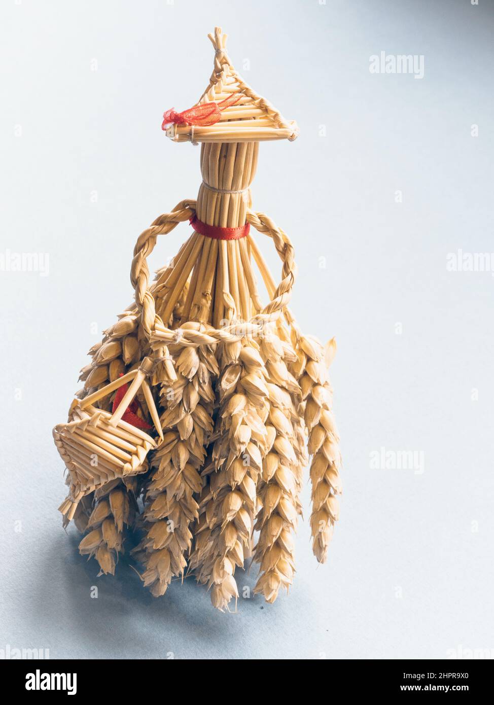 Handmade English 'Harvest Maid' corn dolly also known as 'Corn Mothers', 'Corn Dolls' or 'Corn Maidens' made from wheat to celebrate the harvest being Stock Photo