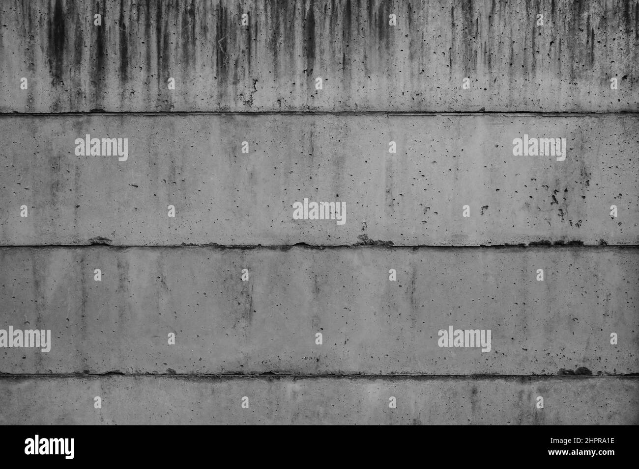 Damaged and abandoned old concrete wall texture. Stock Photo