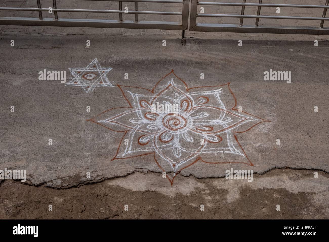 Rangoli is an art originating in the Indian subcontinent, in which ...