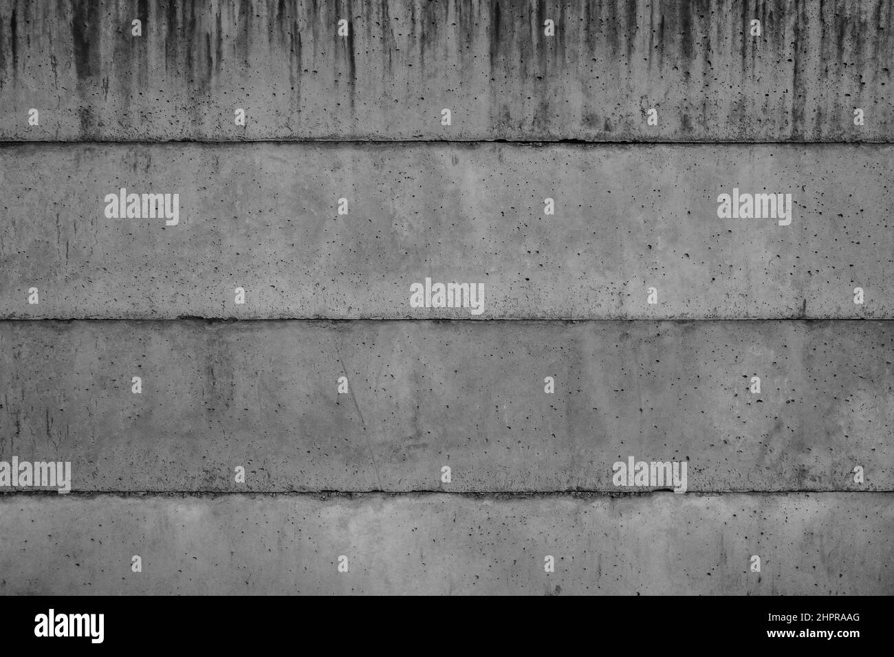 Damaged and abandoned old concrete wall texture. Stock Photo