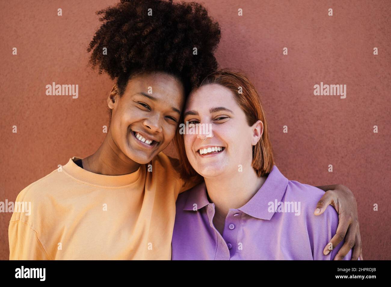 Multiracial friends having fun together outdoor - Focus on african girl ...