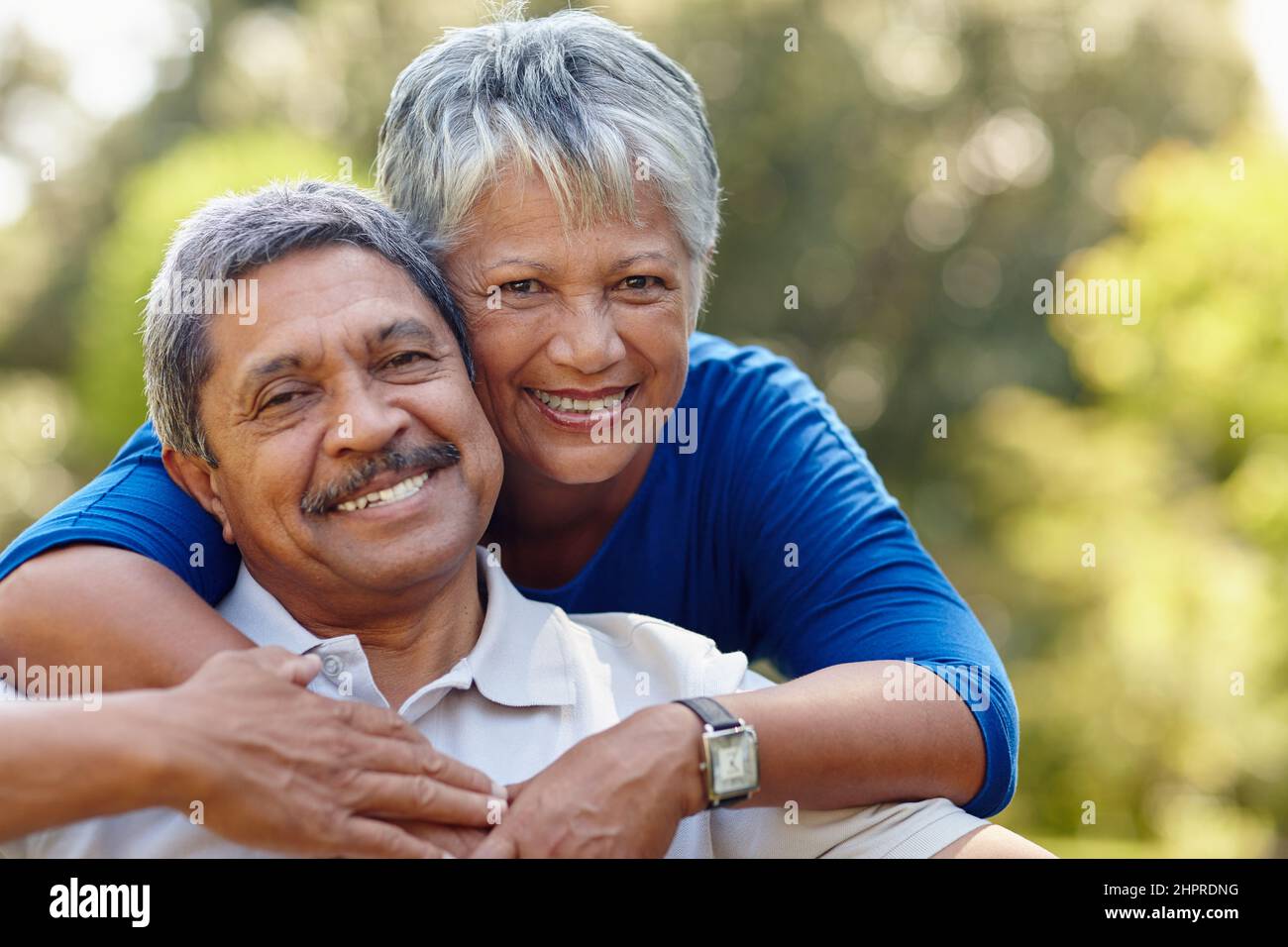 This is what real love looks like. Shot of a loving senior couple enjoying quality time together outdoors. Stock Photo