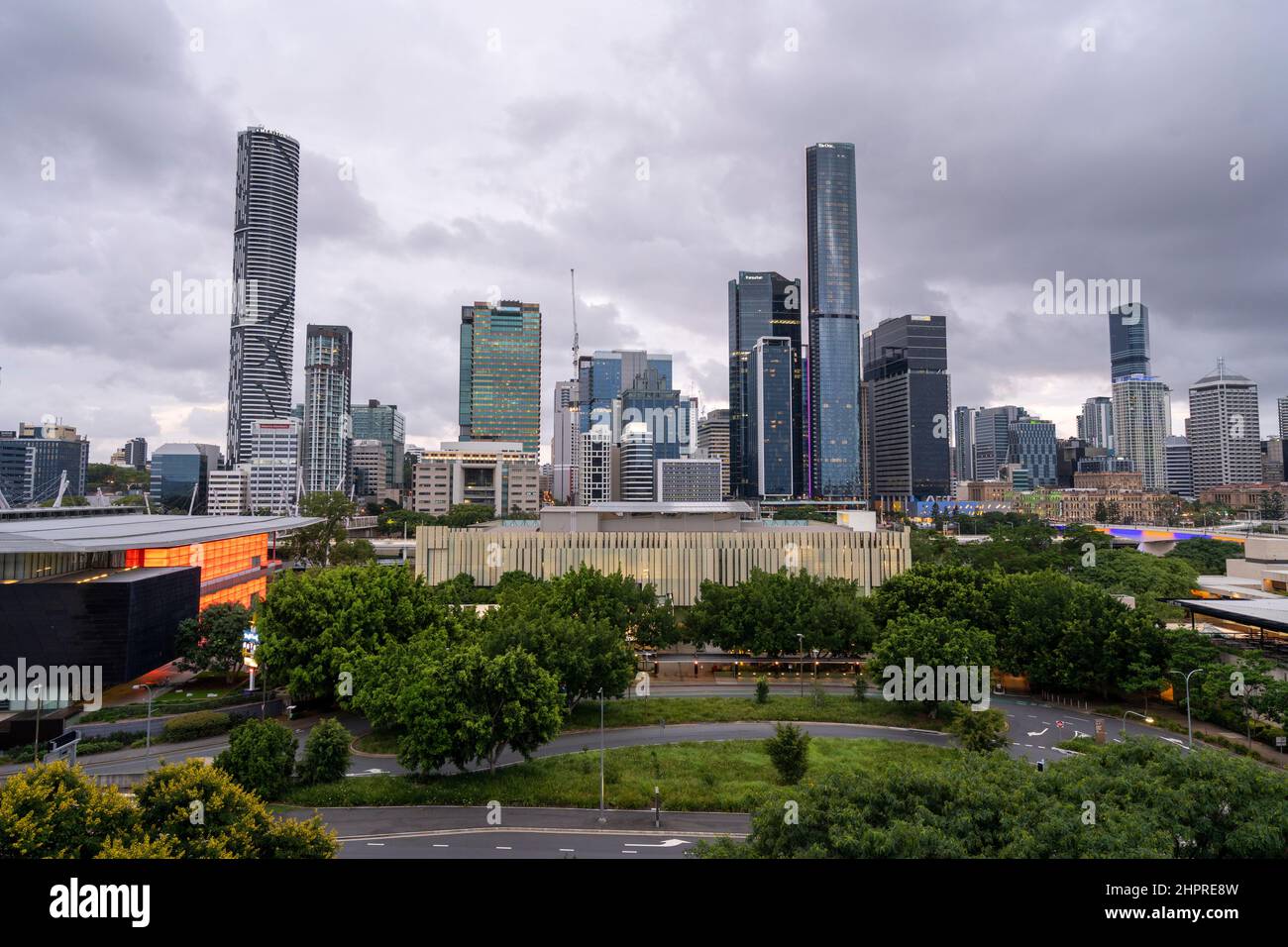 Brisbane CBD skyline with stormy sky seen from Southbank of Brisbane River Stock Photo