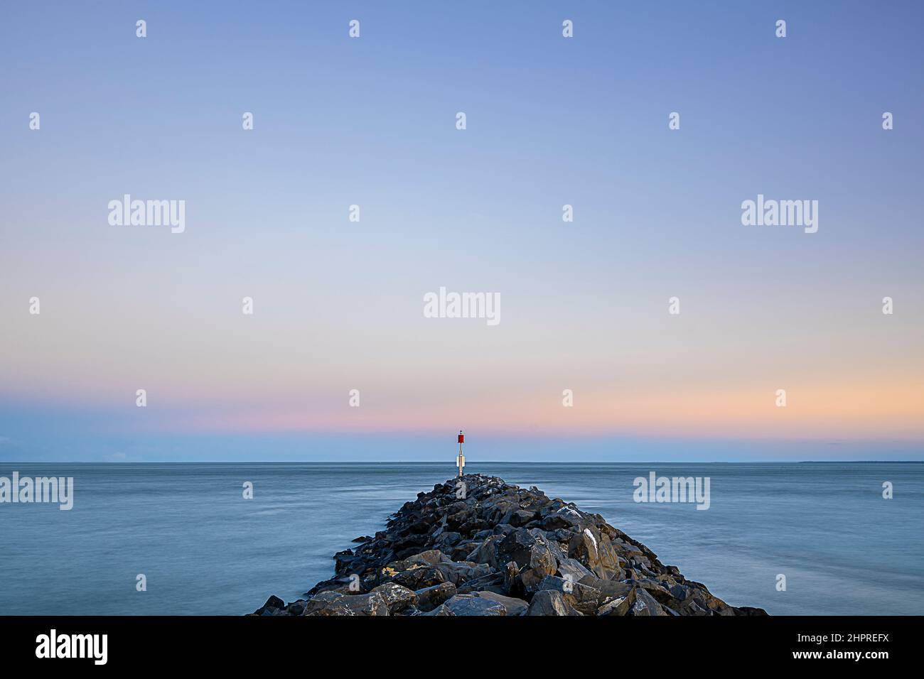 Stone wall and navigation marker, Hervey Bay, Queensland, Australia