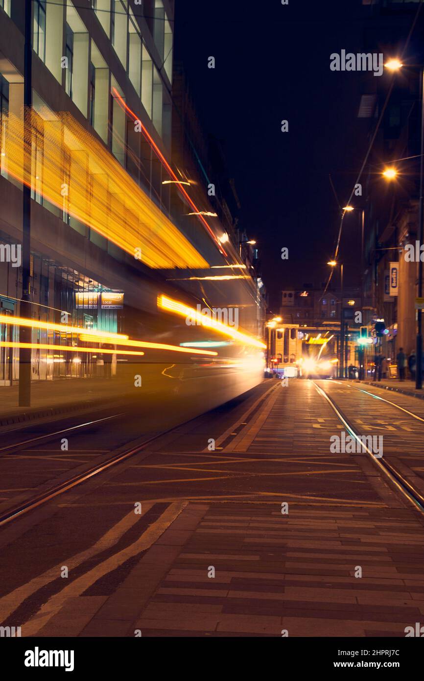 Long exposure of Manchester trams at night Stock Photo