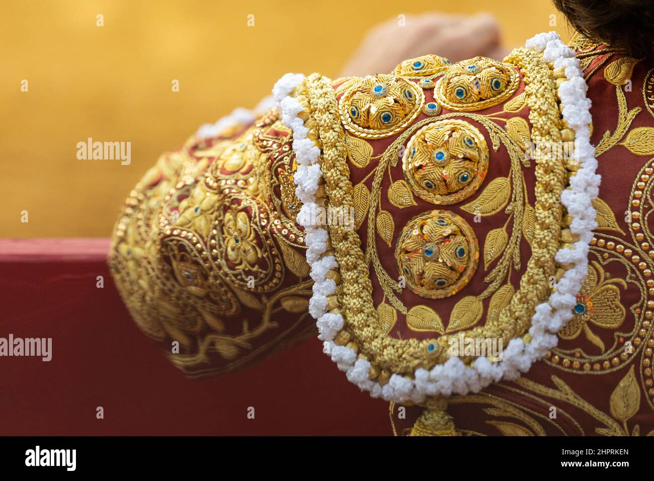 bullfighter dressed in his famous bullfighter's costume ready to fight a brave bull in the ring. Stock Photo