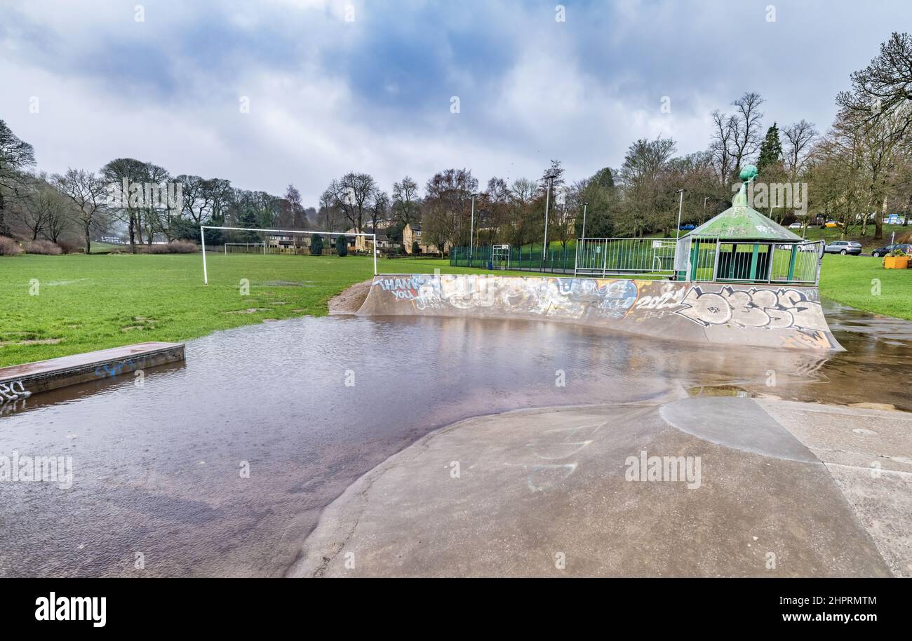 Waterlogged skatepark and recreational grounds, no children due to weather. Stock Photo