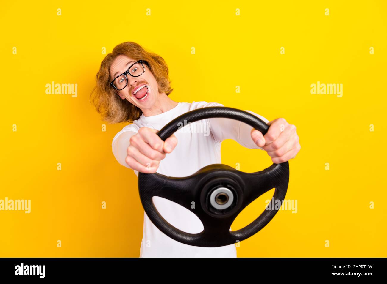 Photo of funky excited guy wear white shirt spectacles driving auto