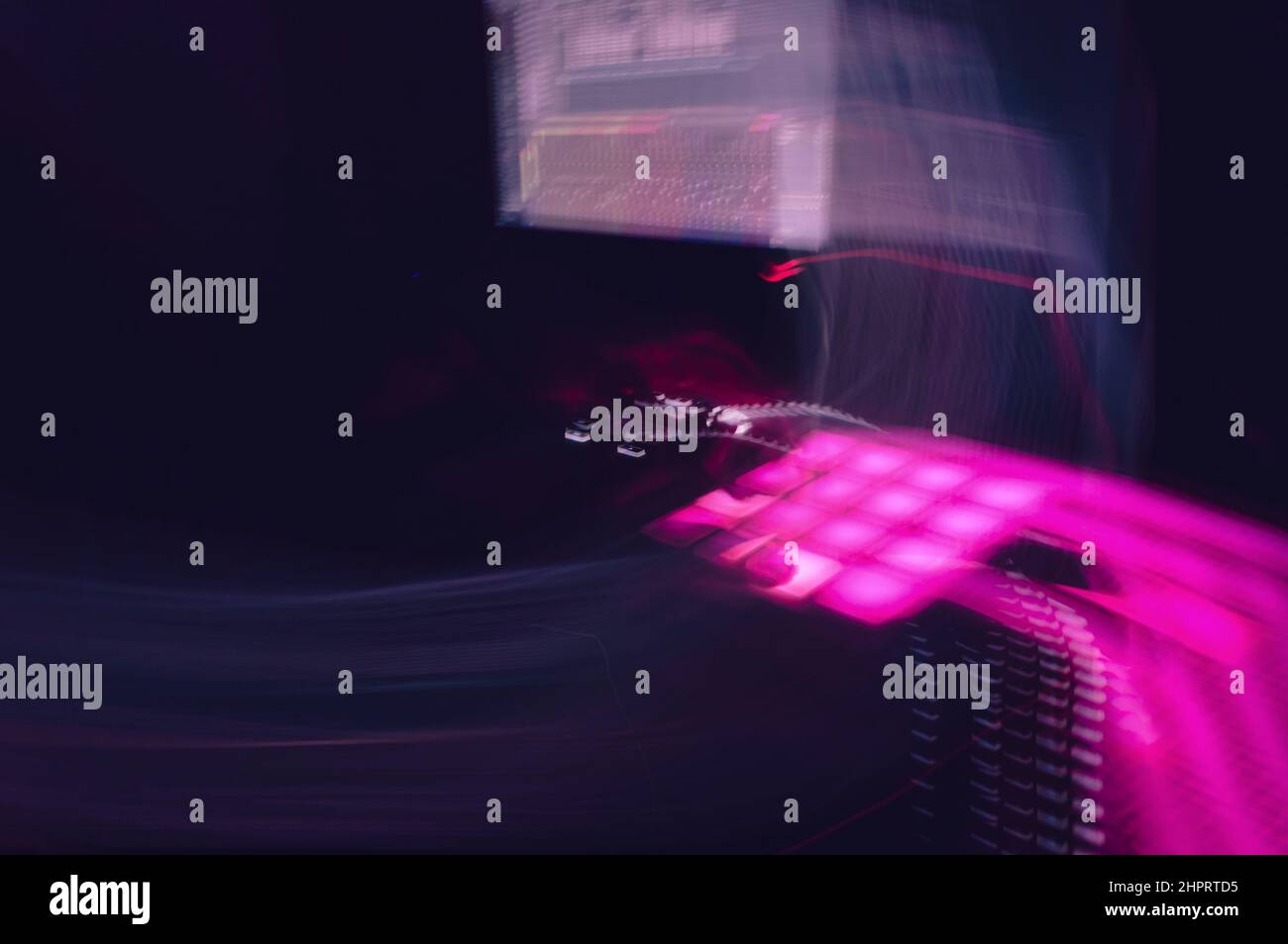 graphic resource of abstract blurred image in music studio, with light painting of pink and blue colors with copy space. Stock Photo