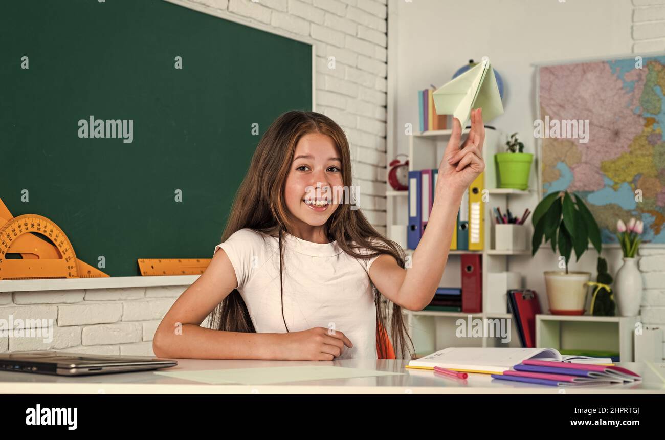 Pupil girl study at school in workplace classroom, learning Stock Photo ...