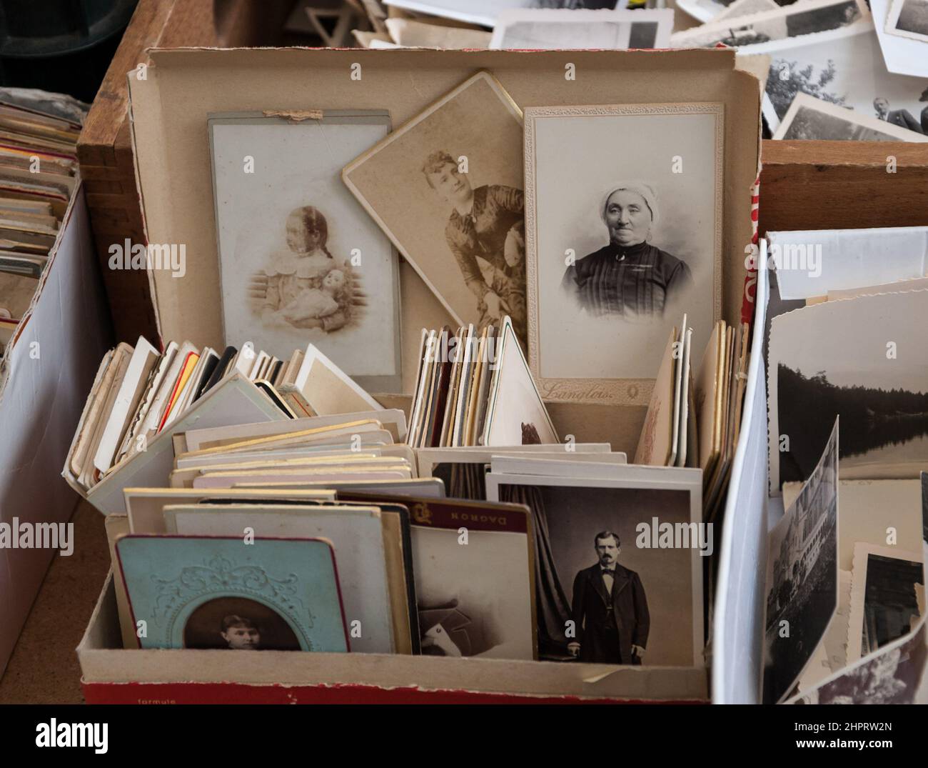 Old photos at flea market on March 10, 2013 in Paris, France. Stock Photo