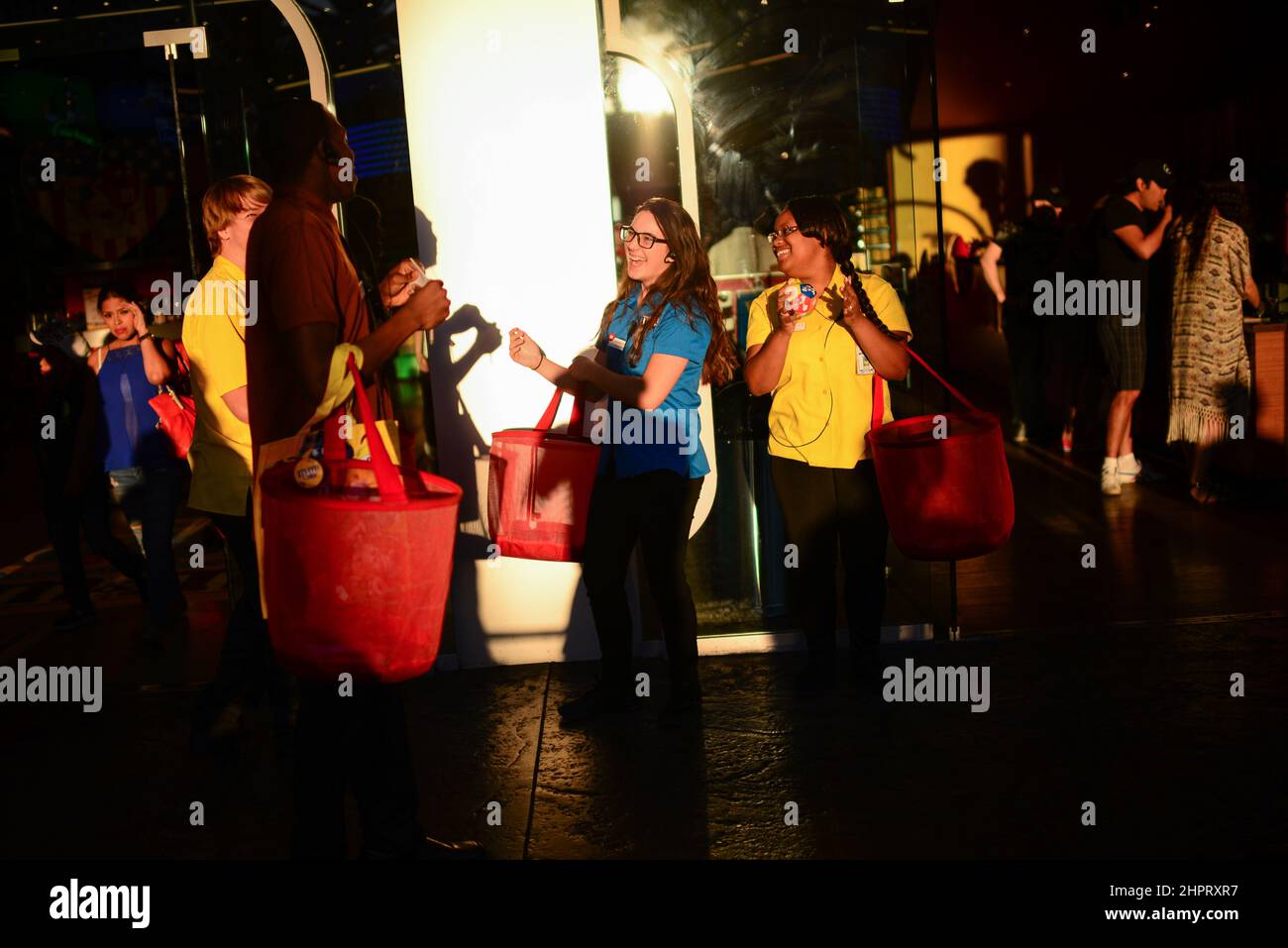 Employees of store singing and dancing in the street to attract clients ...