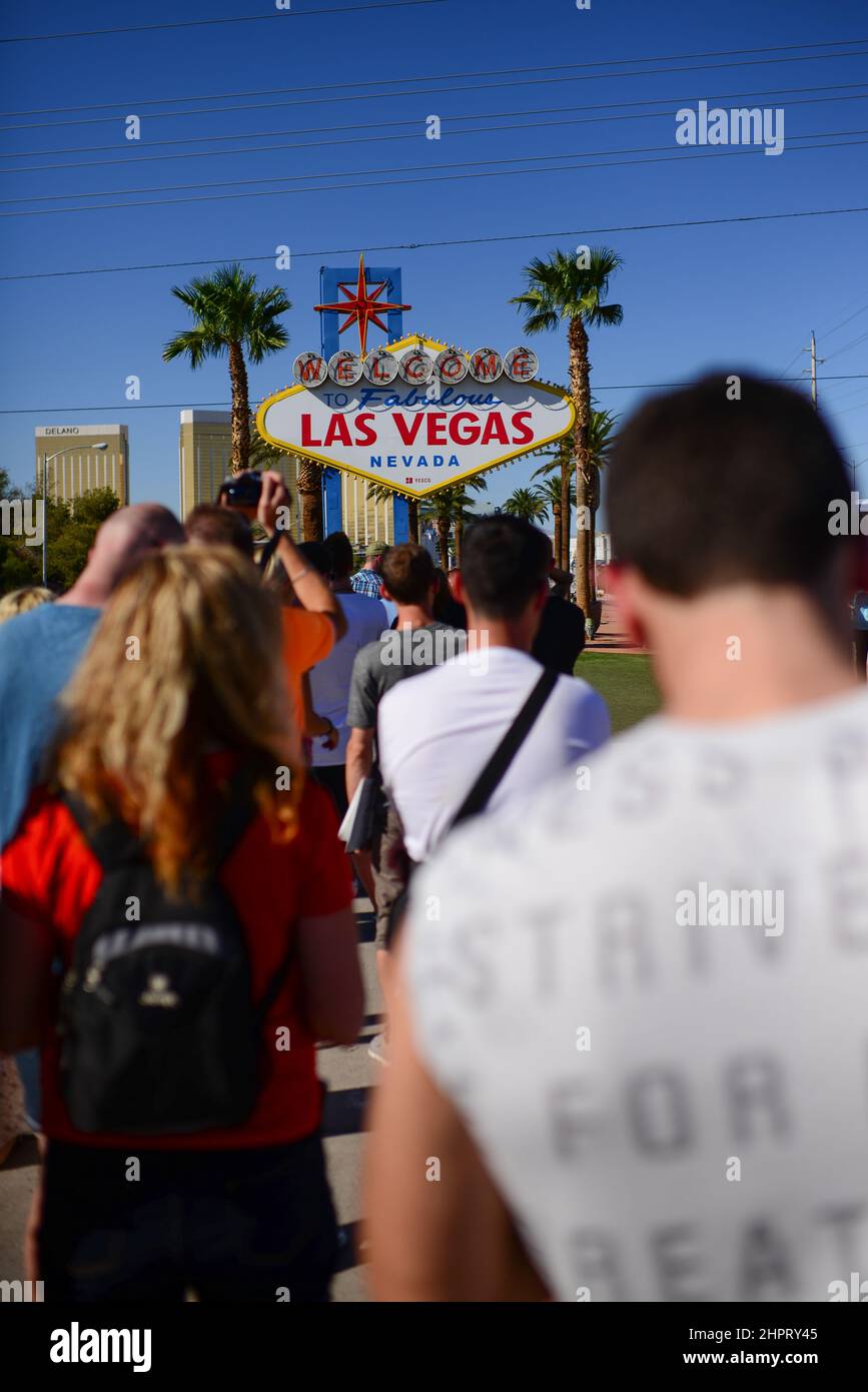 Famous Welcome to Fabulous Las Vegas sign superimposed over view of  southern end of Las Vegas at dawn Stock Photo - Alamy