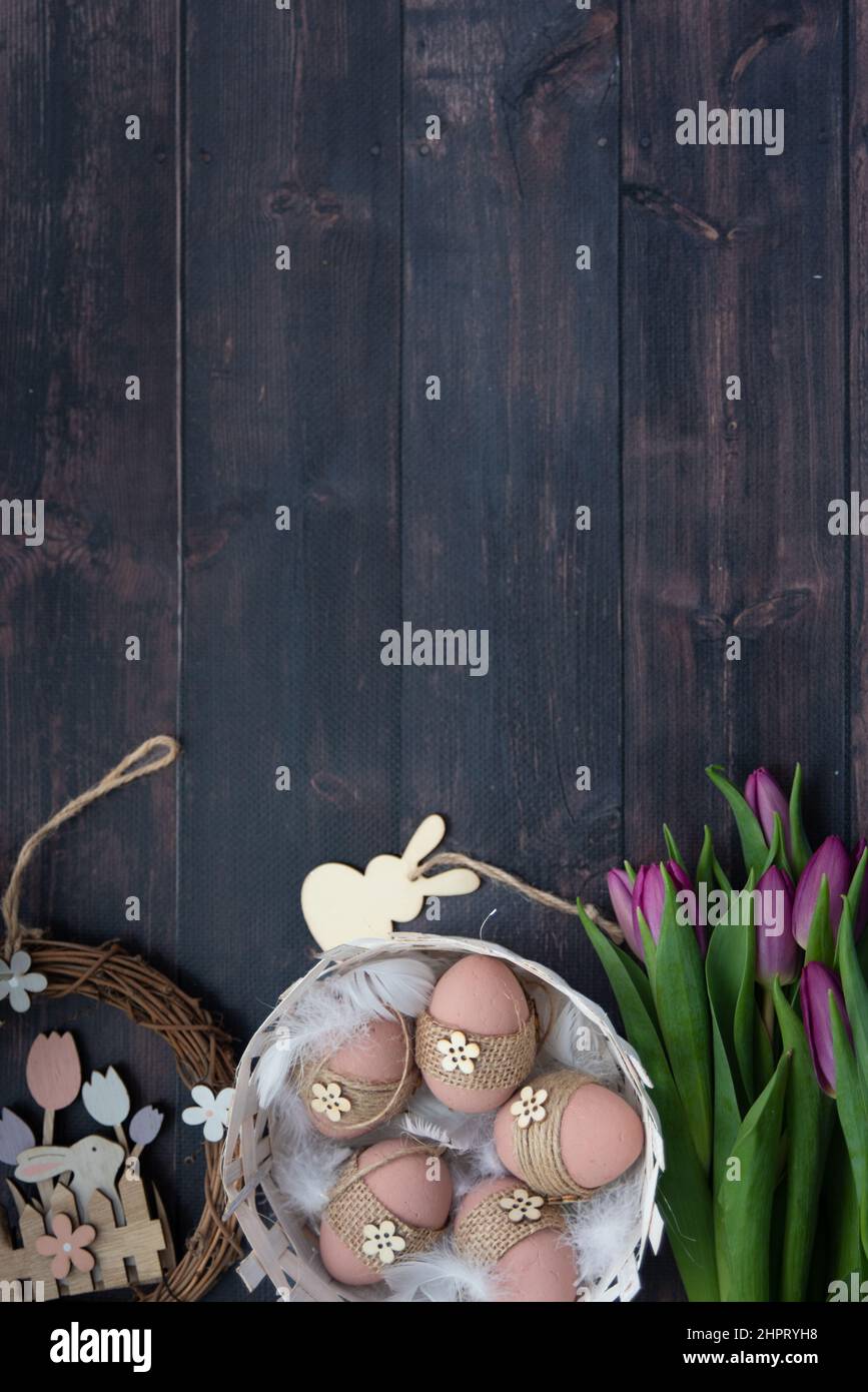 A high angle view of easter decorations and tulips Stock Photo
