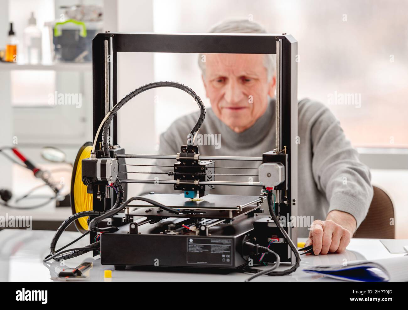 Man with 3D printer Stock Photo