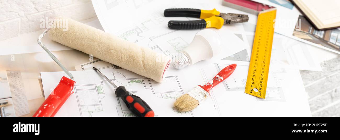 Construction blueprints with tools and tablet, top view Stock Photo