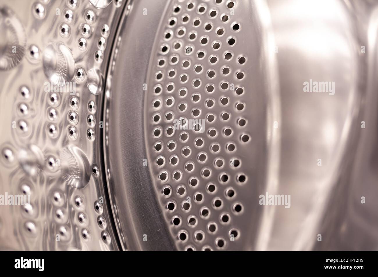 Drum of washing machine dry and clean closeup. Washing Dryer Machine
