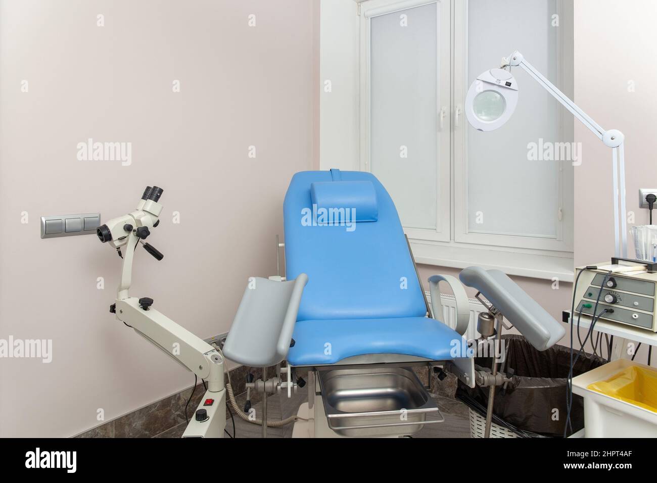 Gynecological chair and other medical equipment in a gynecological office. Stock Photo