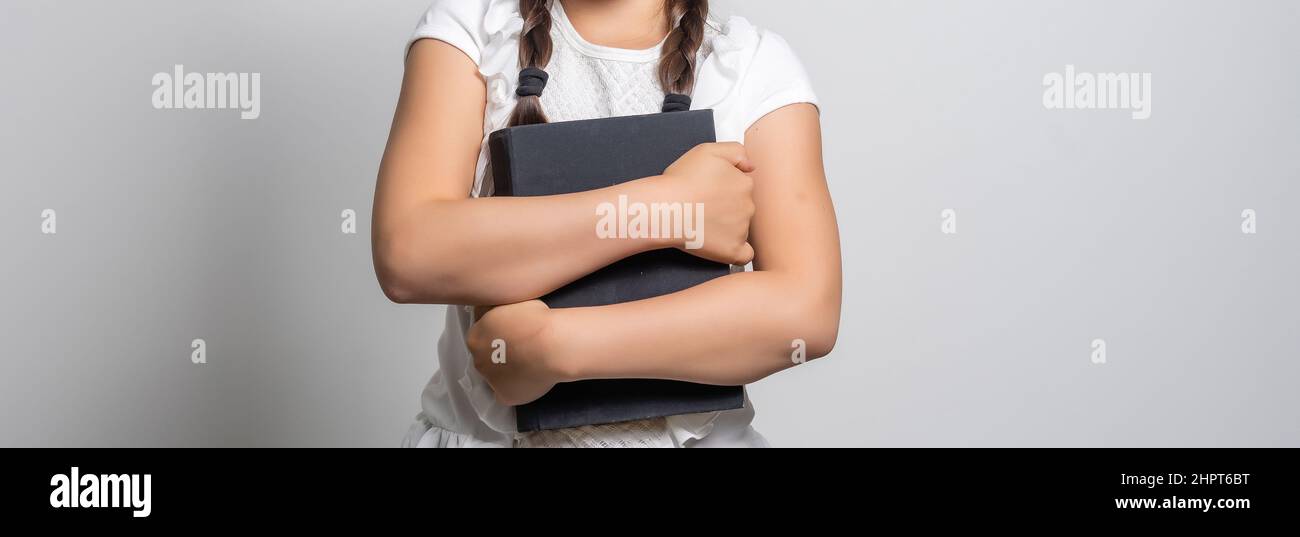 Portrait of a smiling little schoolgirl Stock Photo - Alamy