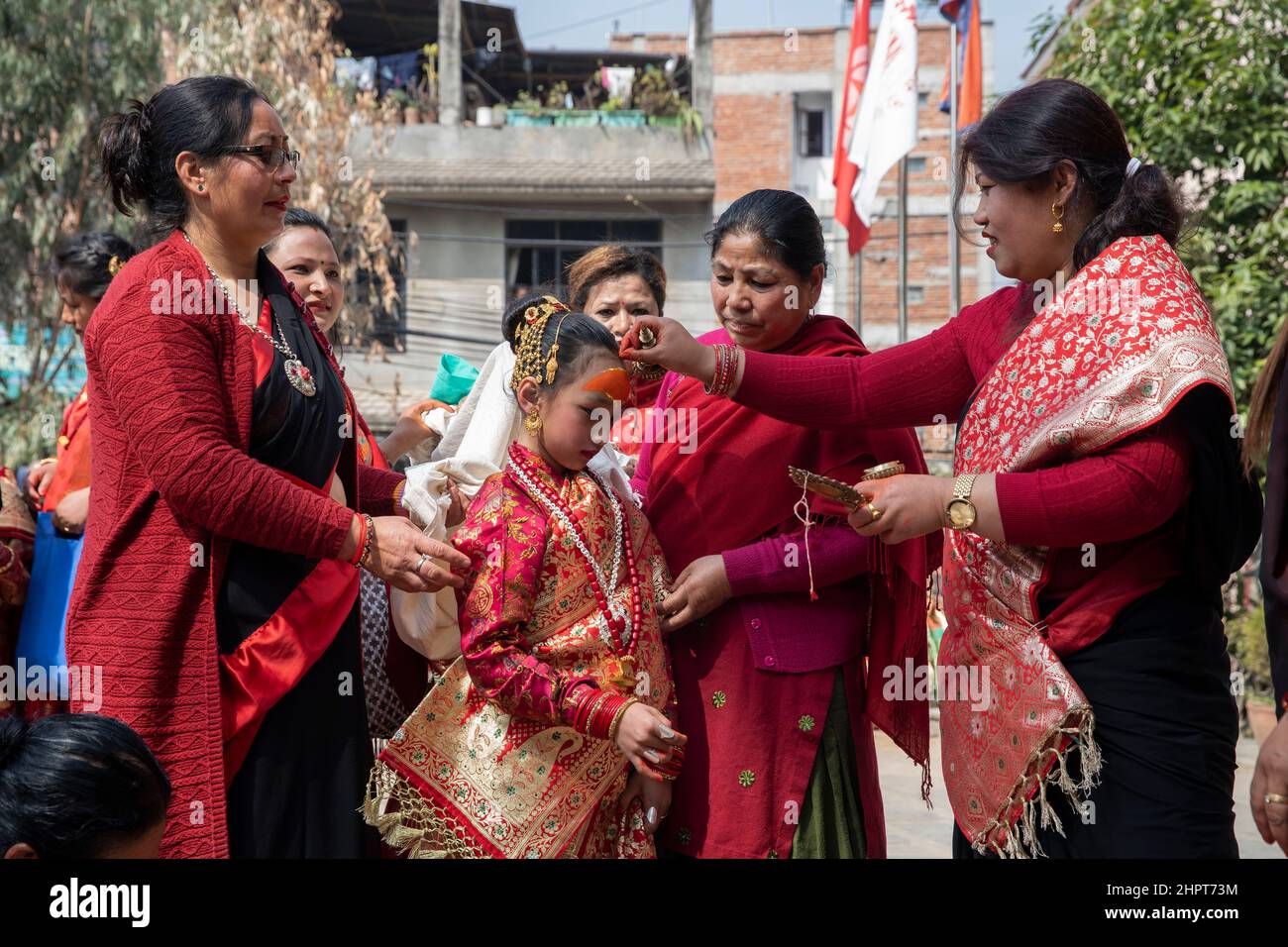 Lalitpur, Nepal. 23rd Feb, 2022. A girl participates in a puberty ceremony known as Gufa in Lalitpur, Nepal, Feb. 23, 2022. Credit: Hari Maharjan/Xinhua/Alamy Live News Stock Photo