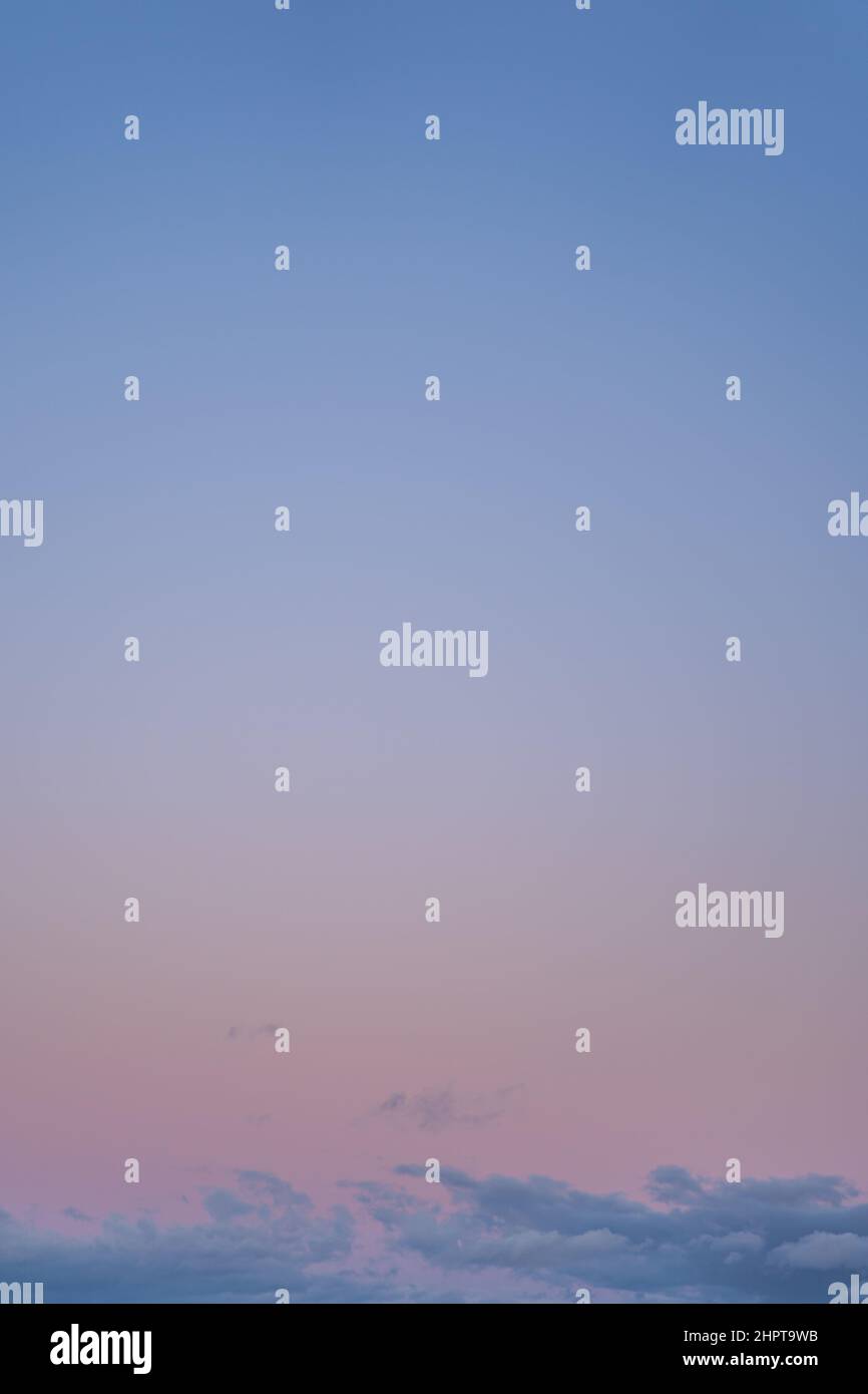 Dramatic Evening Pastel colored sky with clouds and copyspace Stock Photo