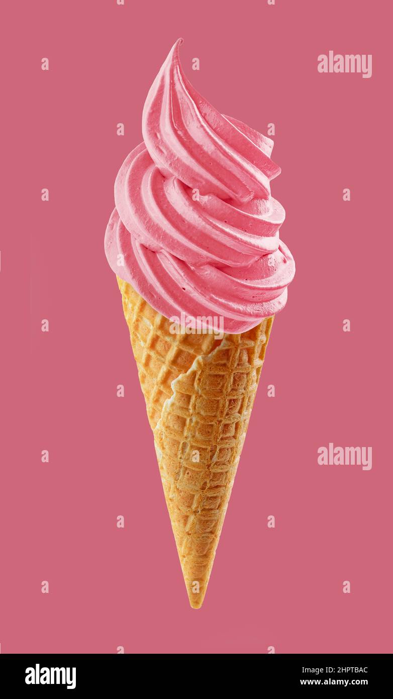 soft ice cream swirl in waffle cone isolated on pink background Stock ...