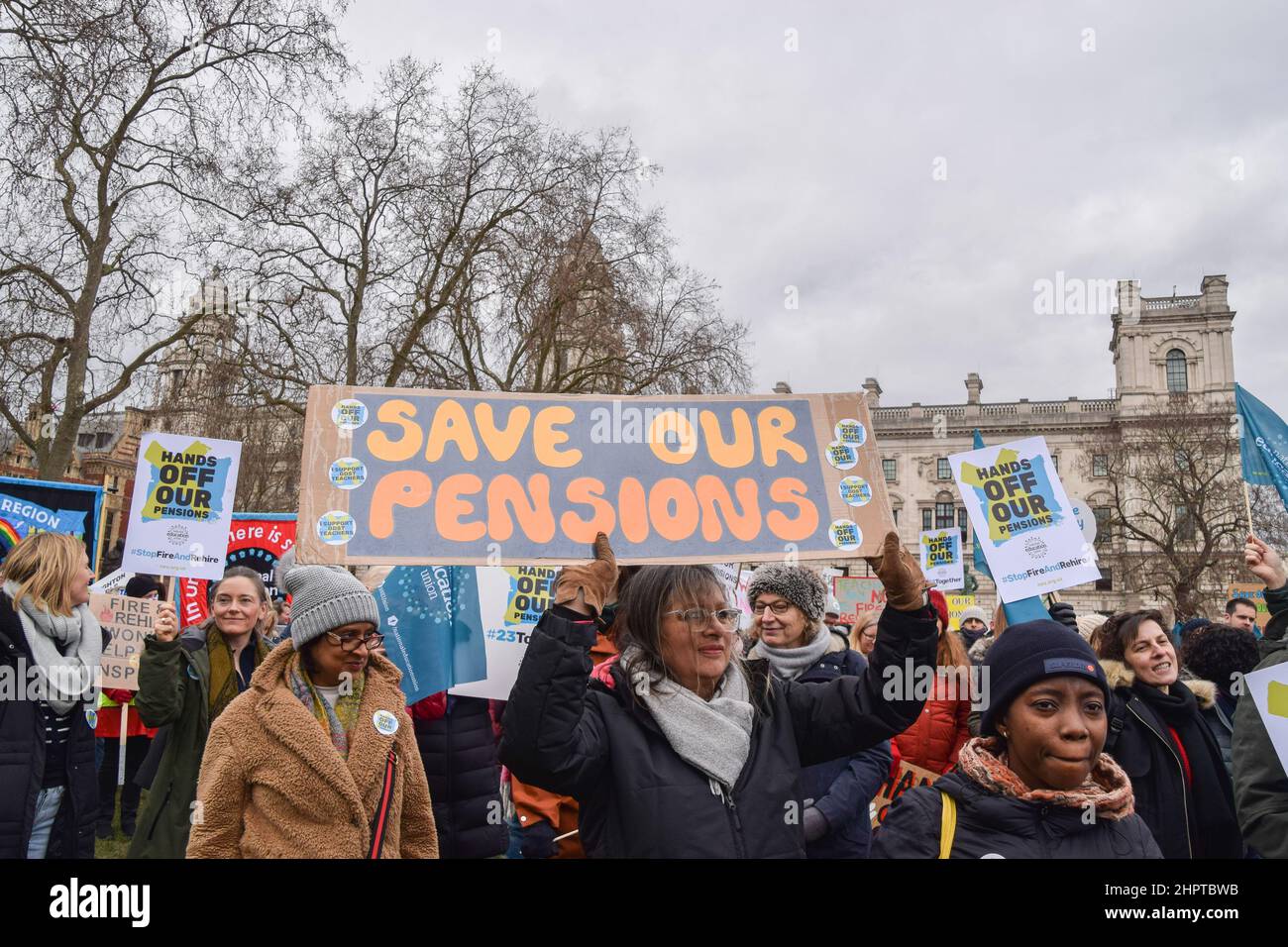 London, England, UK. 23rd Feb, 2022. A protester holds a 'Save Our Pensions' placard. Demonstrators gathered in Parliament Square in protest against Girls' Day School Trust (GDST) cutting pensions for girls school teachers. (Credit Image: © Vuk Valcic/ZUMA Press Wire) Stock Photo