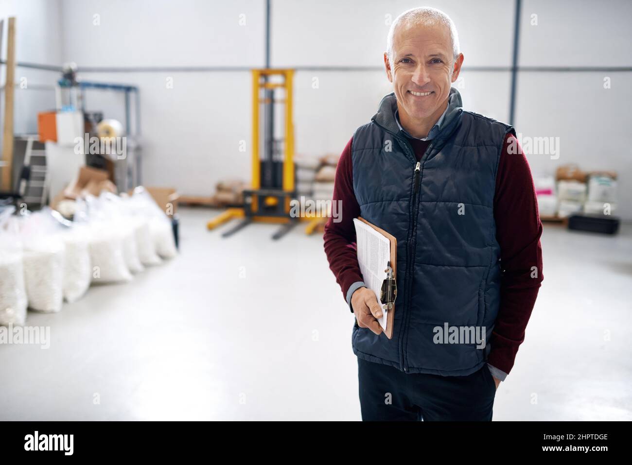 Filing Foreman Here to do some inspecting. Portrait of a male foreman standing on the ...