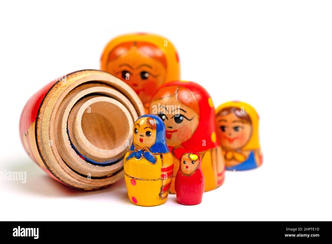 Matryoshka, hand-painted wooden dolls against a white background Stock Photo
