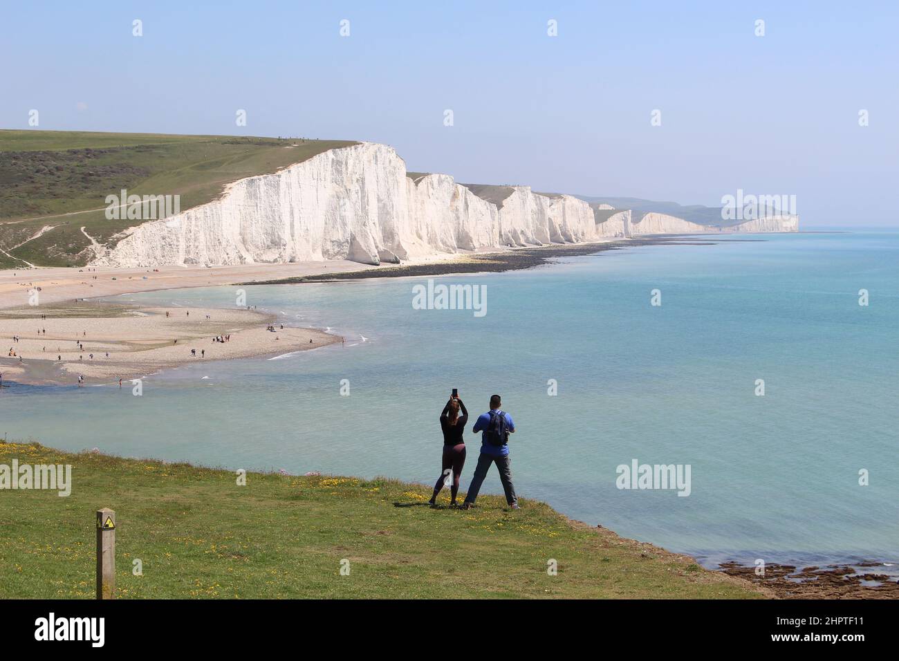 Tourists stopping to take photos of the seven sisters white chalk