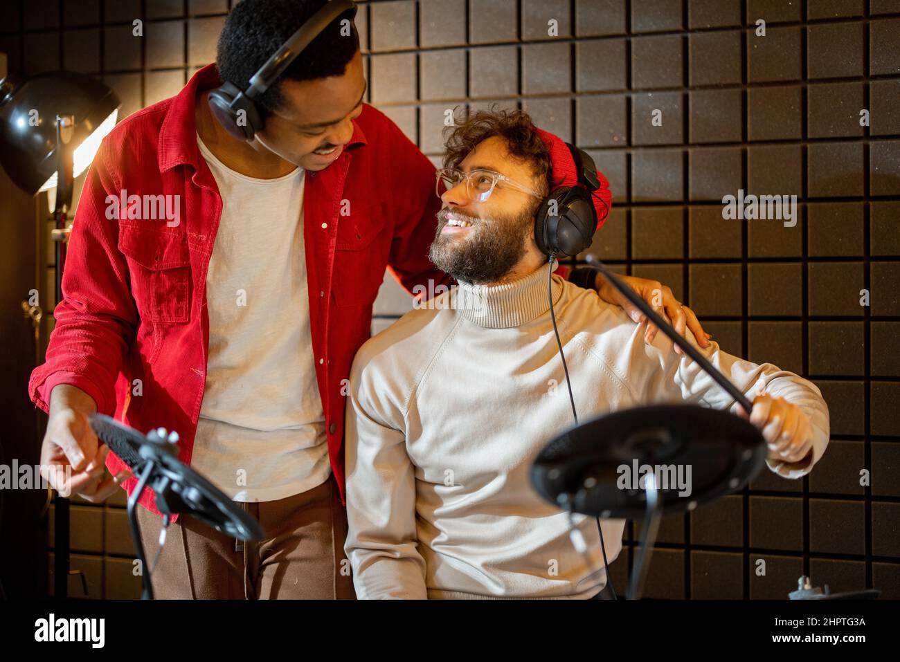 Men playing electric drums at home sstudio Stock Photo