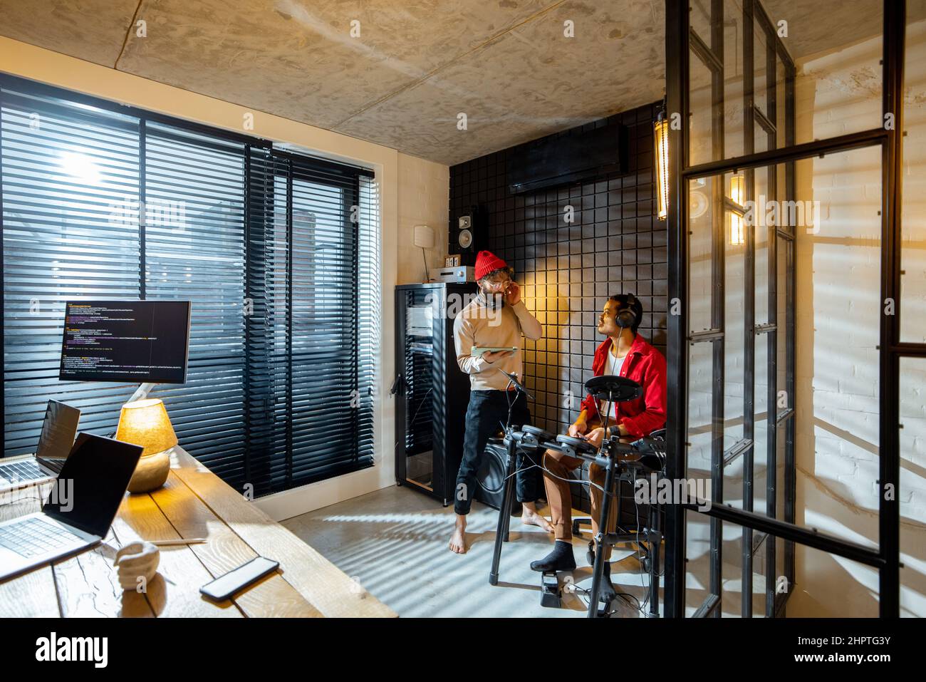 Men playing electric drums at home sstudio Stock Photo