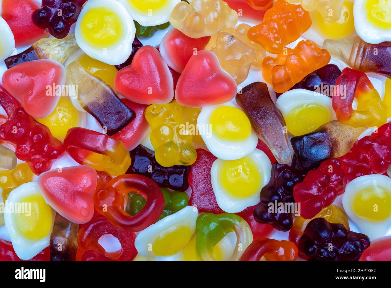 colorful mixed jelly, gummy sweets, candy macro background Stock Photo Alamy