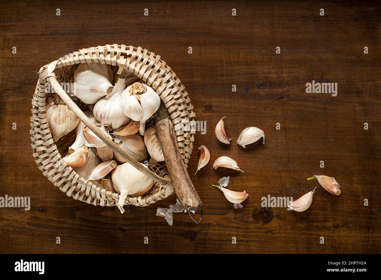 Garlic cloves on wooden vintage background Stock Photo - Alamy