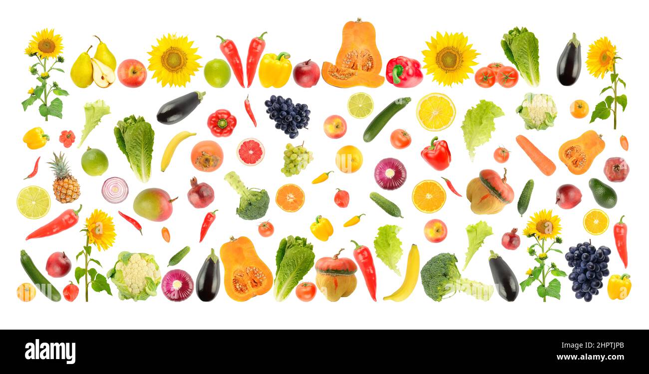 Large bright background of fresh vegetables and fruits isolated on white. Stock Photo