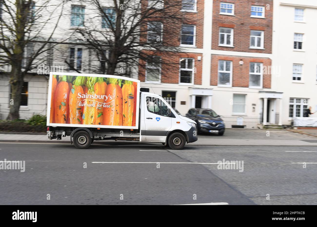 Sainsburys home delivery van driving on road in Southampton UK Stock