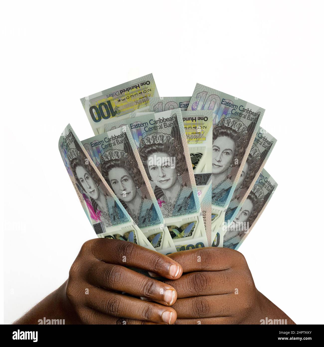 hands-holding-3d-rendered-eastern-caribbean-dollar-notes-stock-photo