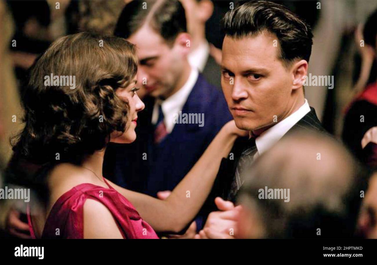 PUBLIC ENEMIES 2009 Universal Pictures film with Johnny Depp as bank robber  John Dillinger and and Marion Cotillard as singer Billie Frechette. Stock Photo