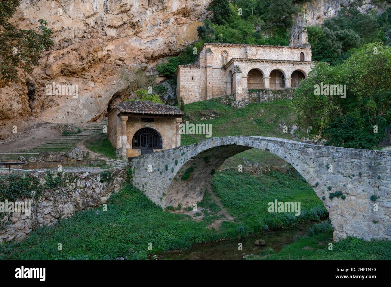 The hermitage Santa Maria de la Hoz and the roman bridge in the village of Tobera. Burgos. Spain Stock Photo