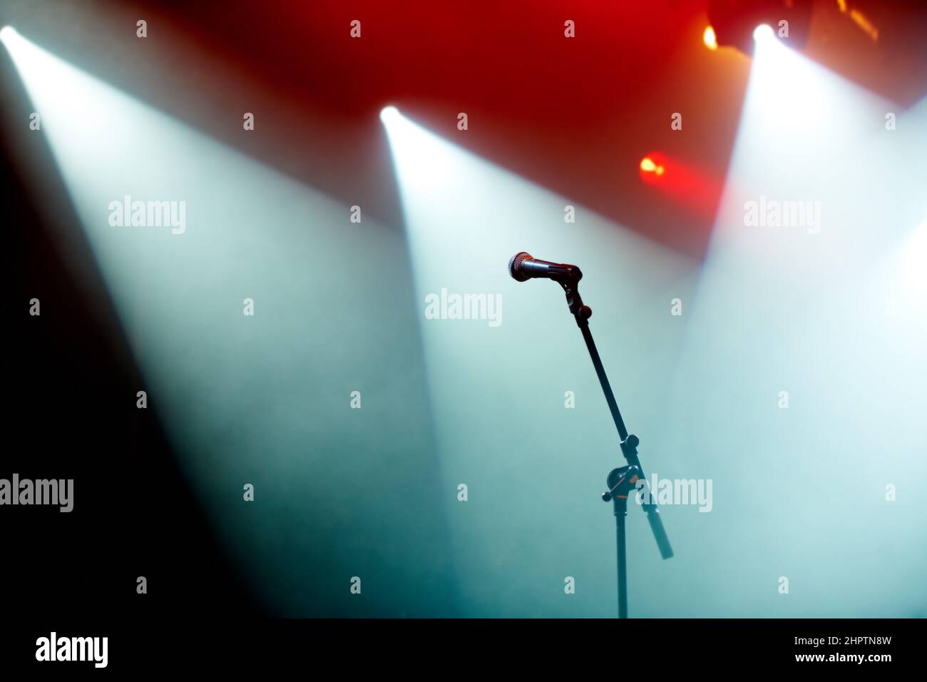 Ready for the concert. A microphone stand on an empty stage. Stock Photo