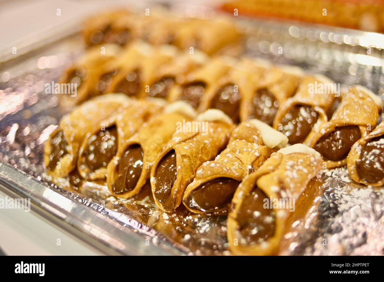 Nutella and cream-filled Italian Sicilian cannoli, tube-shaped deep ...