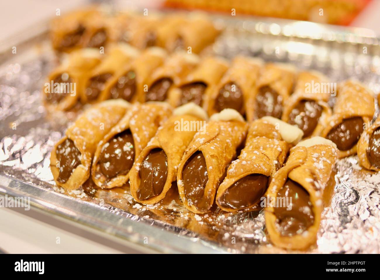 Nutella and cream-filled Italian Sicilian cannoli, tube-shaped deep ...