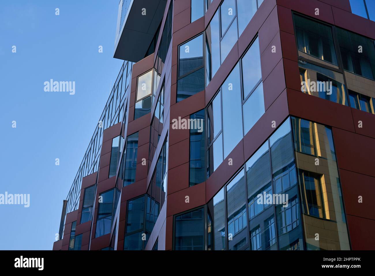 Modern commercial and residential building. Facade made of glass and ...