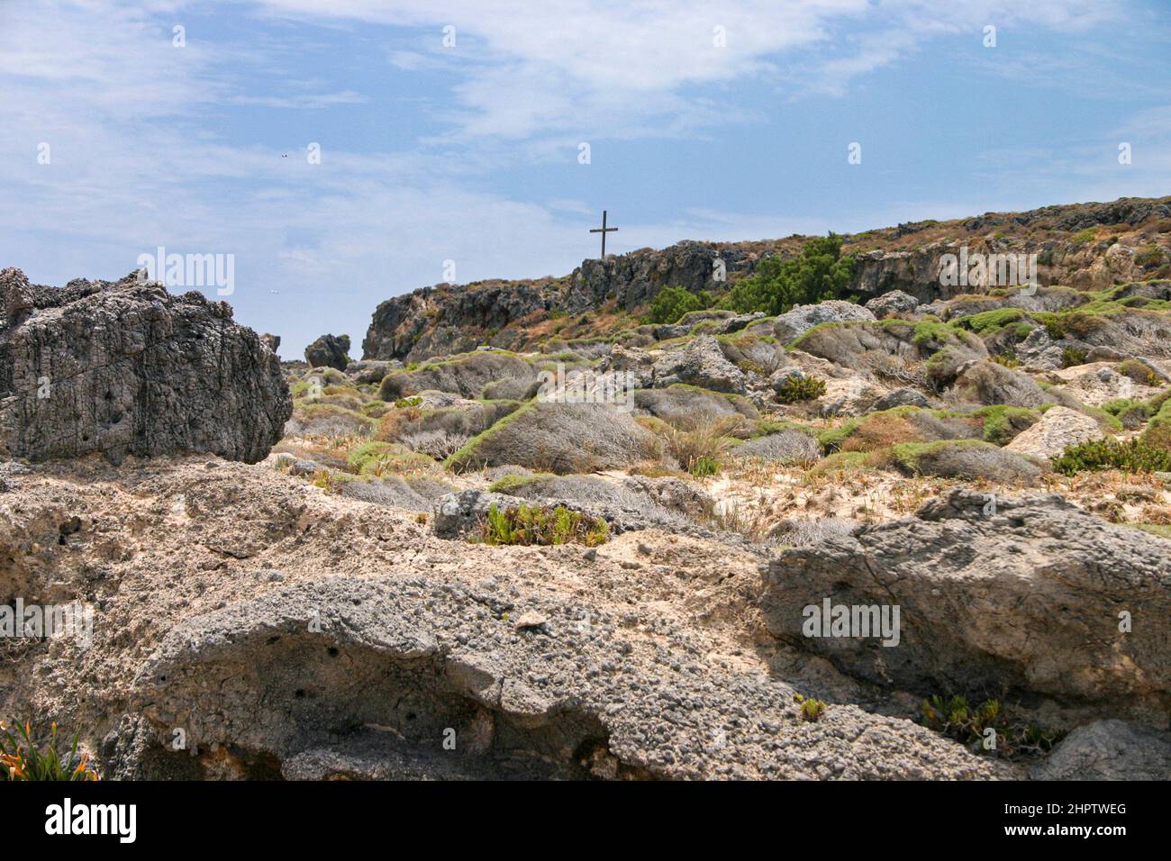 Rough Route to the Chapel of Agia Irini: A rocky route off the beach at Elafonisi on the south-eastern end of Crete is a tiny chapel/memorial. Stock Photo