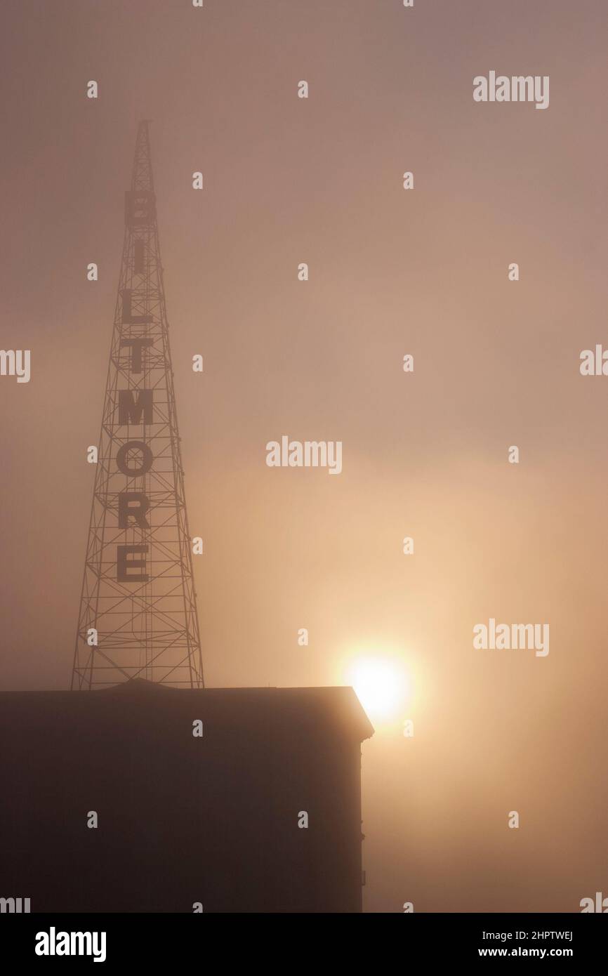 Biltmore WSB transmission Tower in the fog: An early morning foggy view of one end of the iconic and historic original WSB radio transmission tower located on the top of this historic Atlanta Hotel, now owned by the Georgia Institute of Technology. Stock Photo